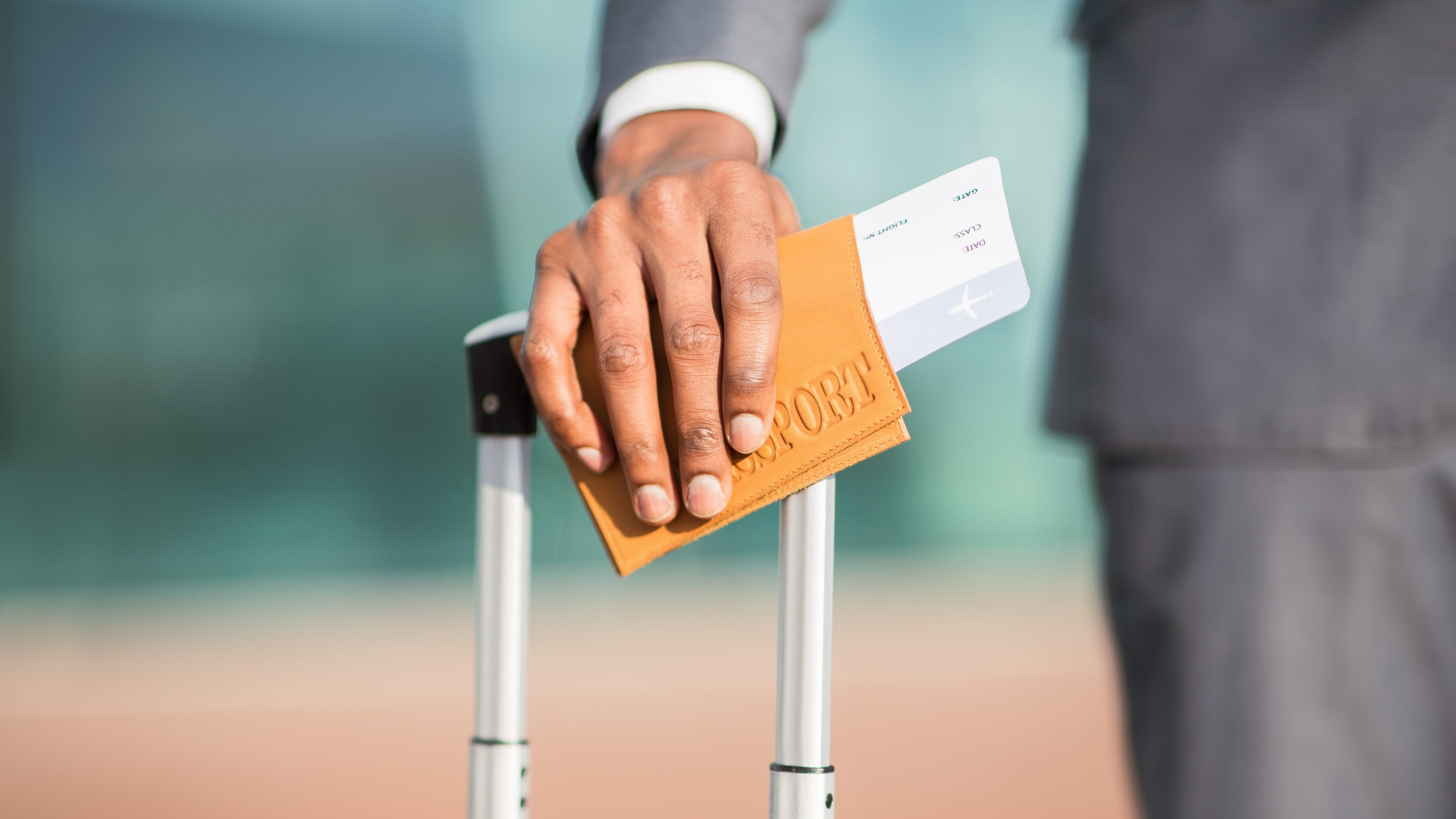 A Businessman Holding Passport