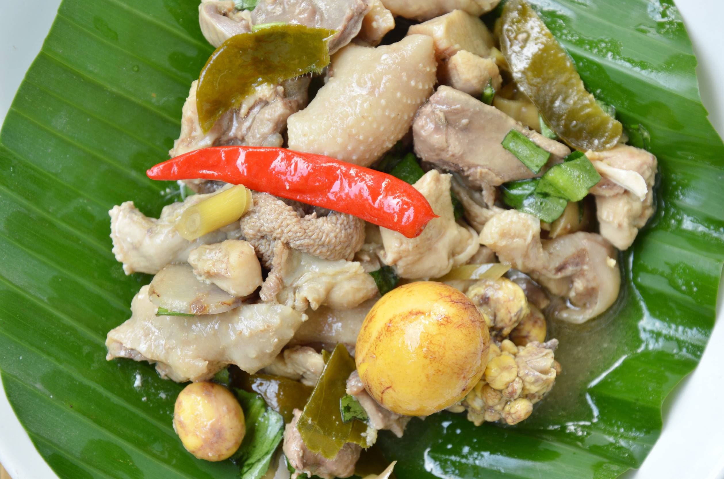 Chicken And Eggs On A Banana Leaf