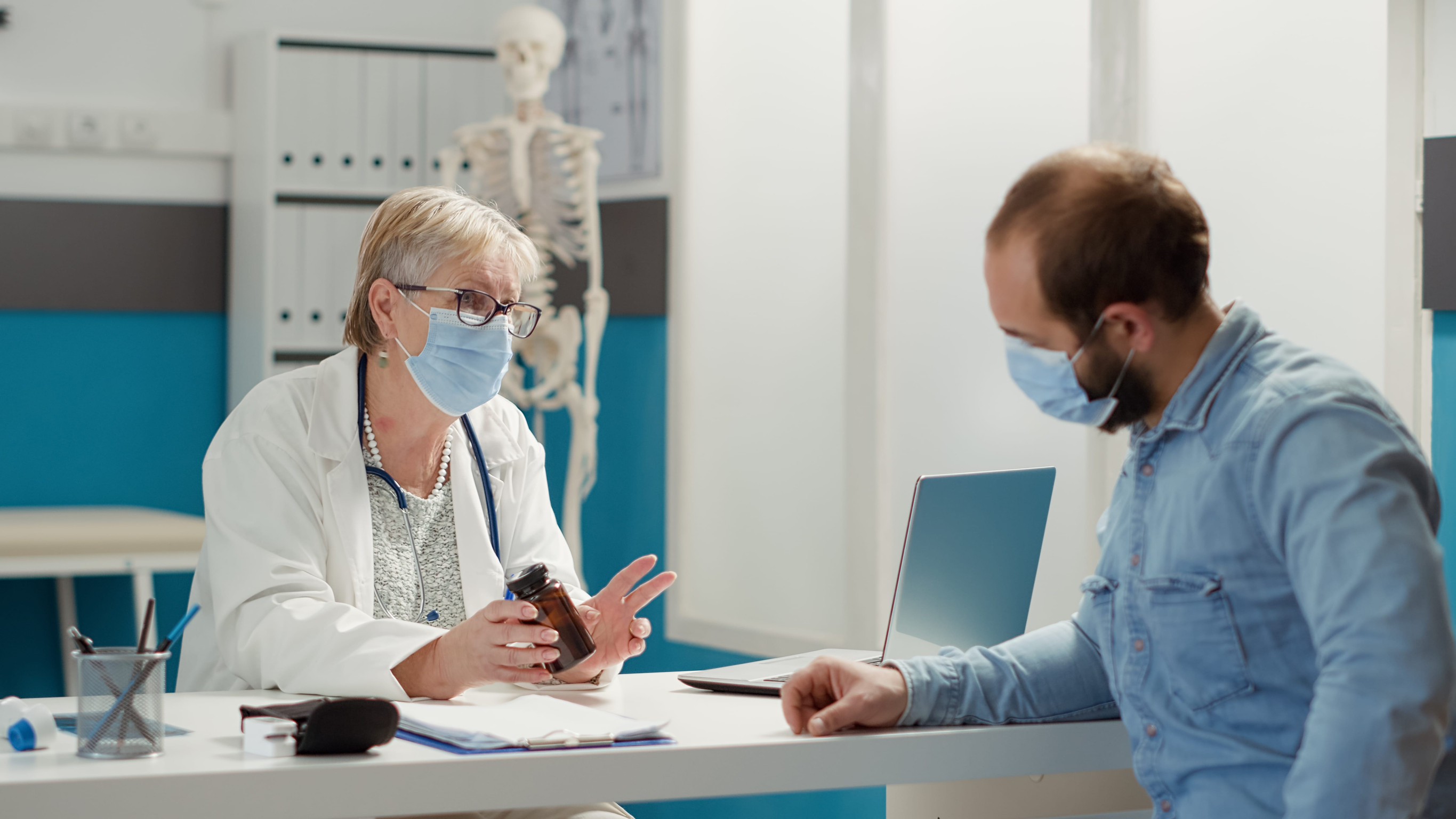 Doctor Giving Medicines To A Patient