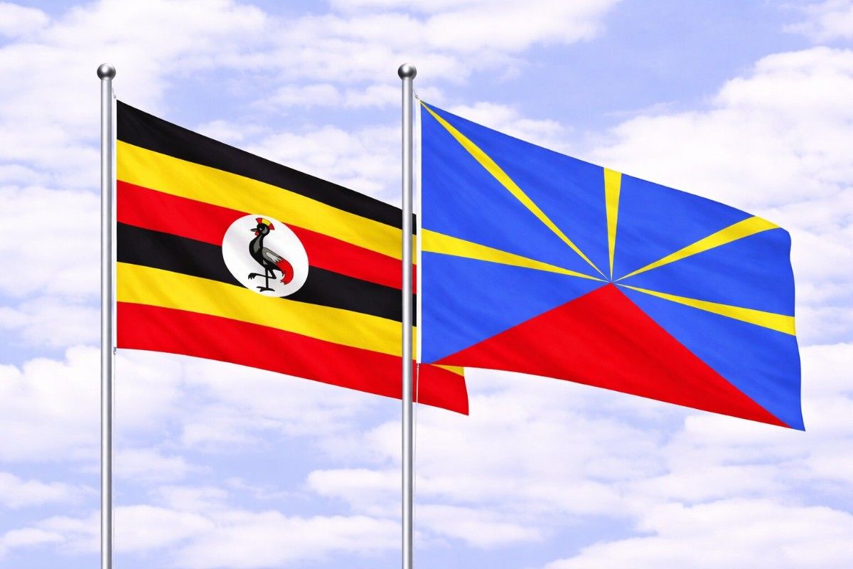 Flags Of Uganda And Reunion