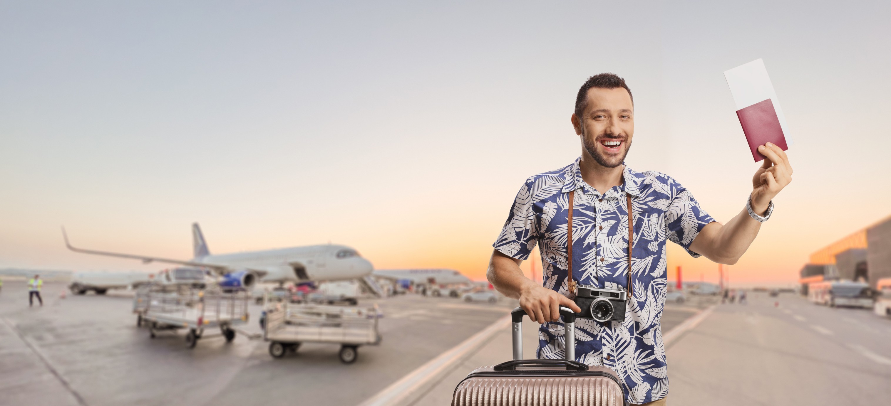 Man Standing On Airport With Passport
