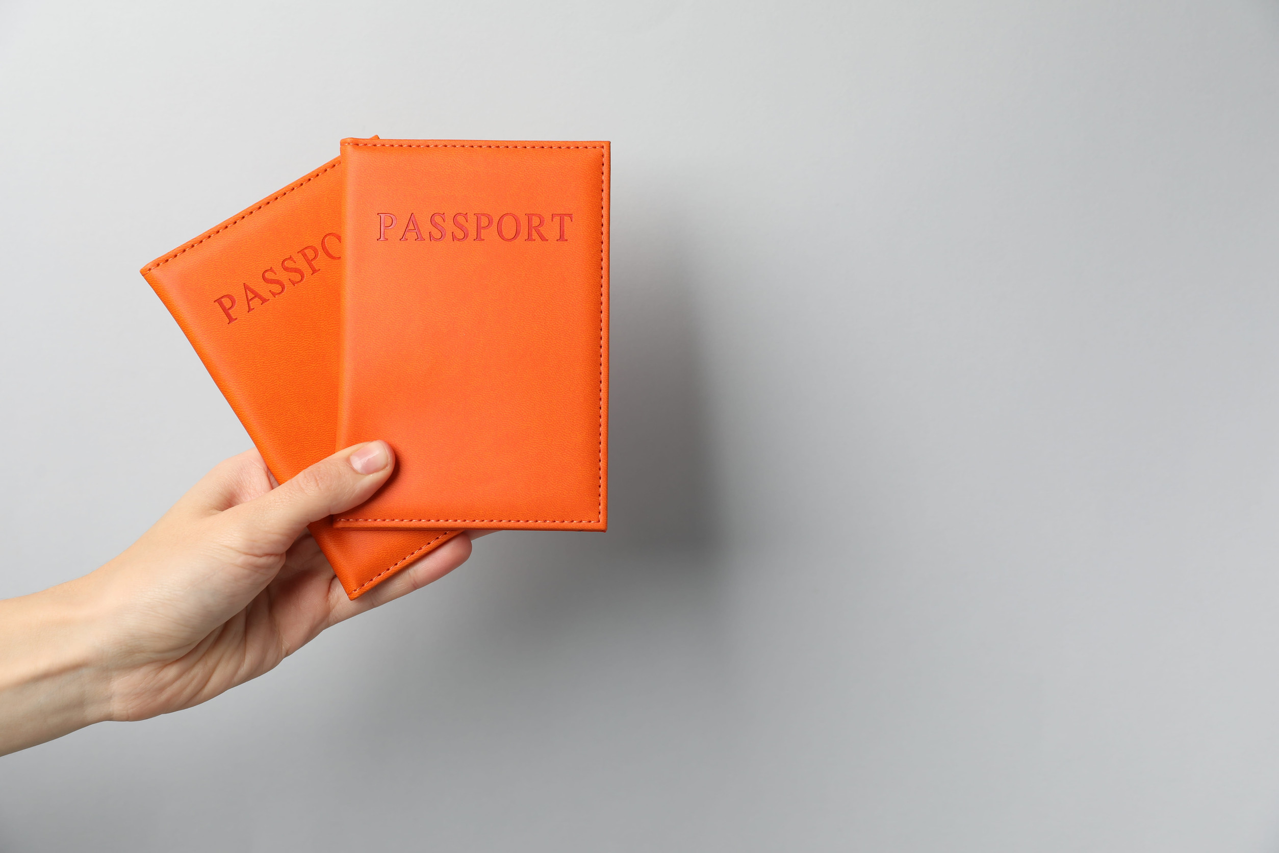 Woman Holding Passports
