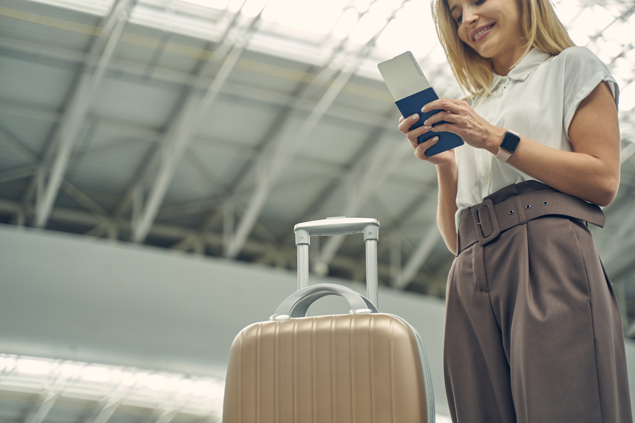 Woman Looking At Passport