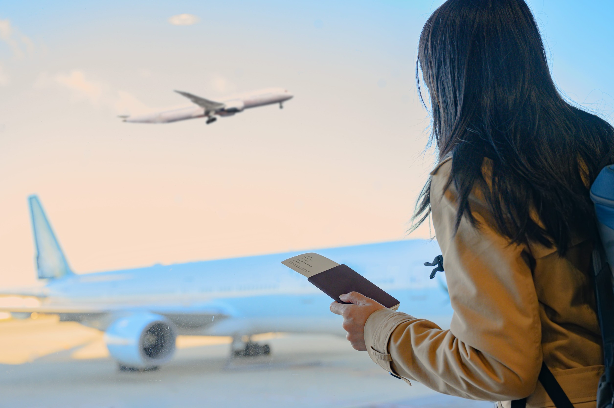 Woman Passenger Holding In Hand Passport