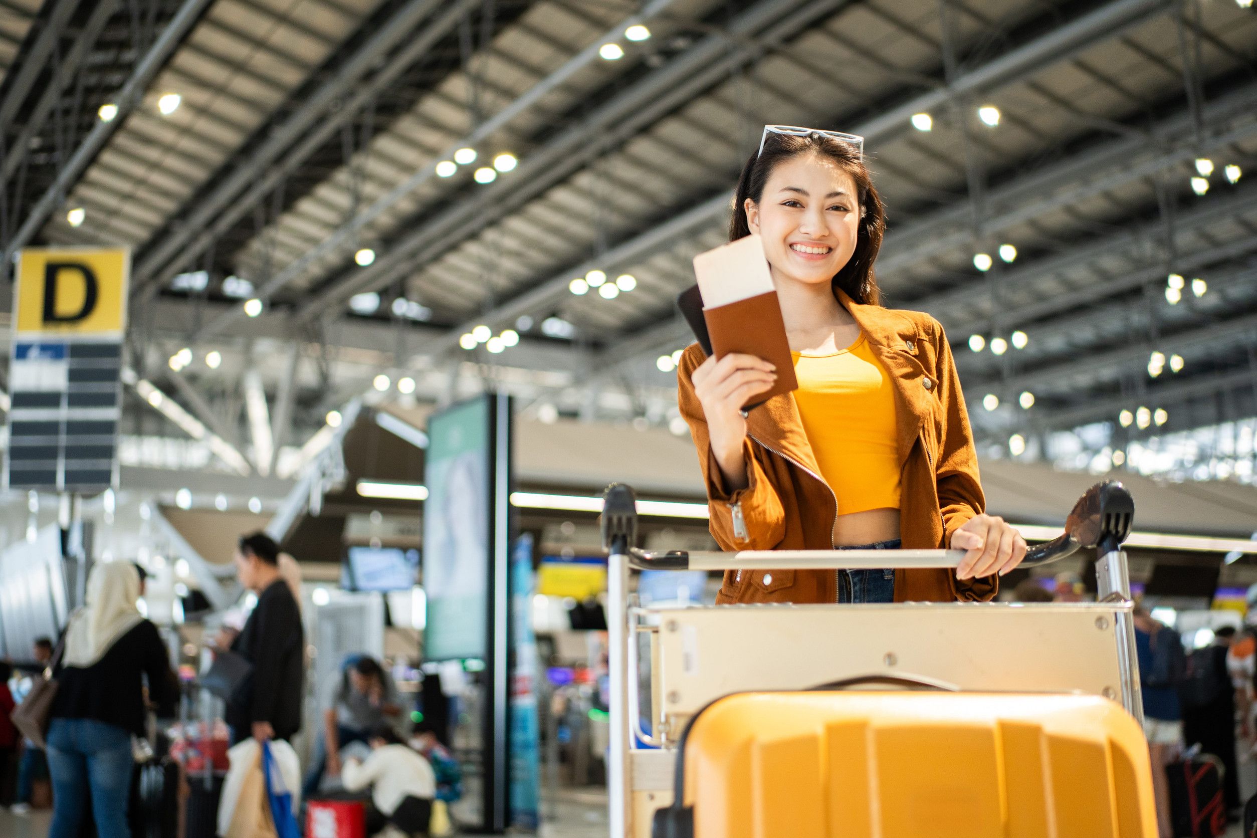 Woman Traveler Holding Passport And Ticket